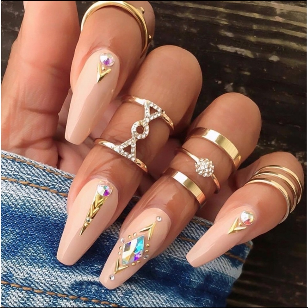 SET OF 5 gold colored rings